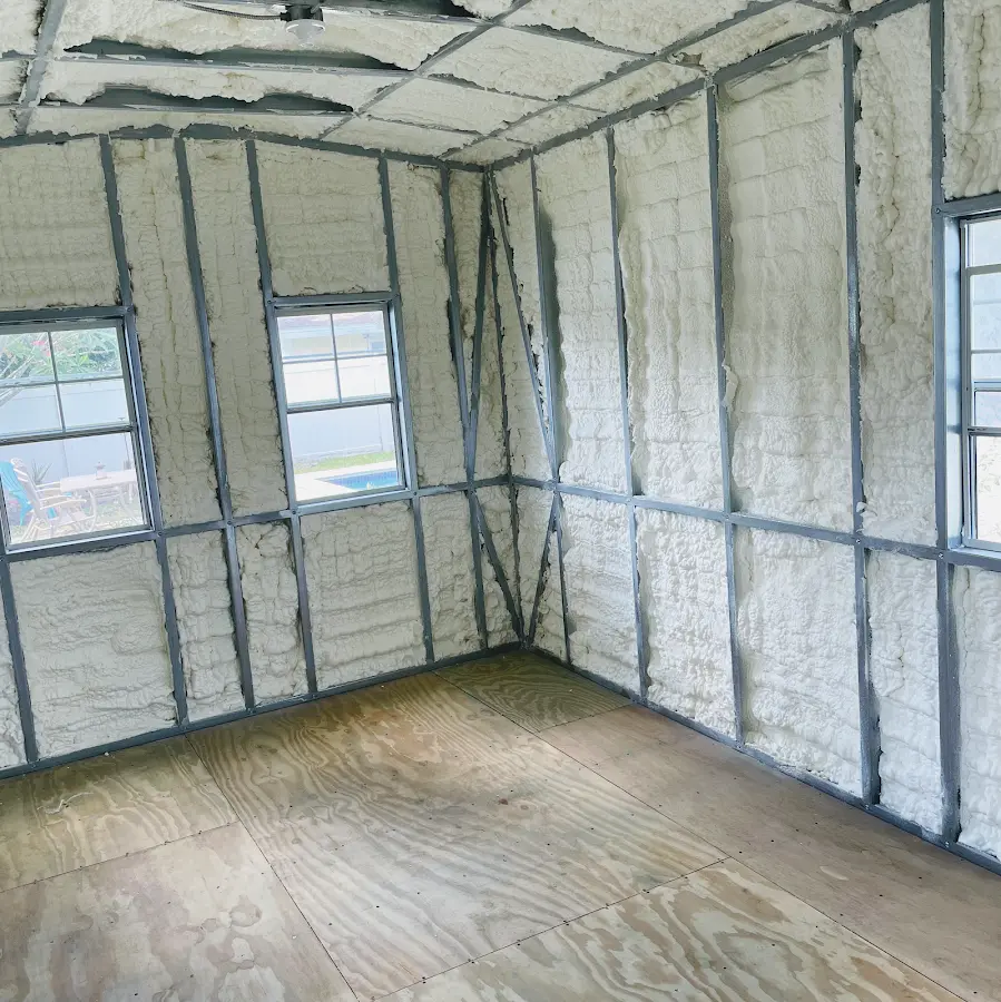 Closed-cell spray foam insulation applied to wall cavities in a residential project in Elfers